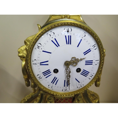 401 - A good quality 19th Century large gilt ormulu mantle clock with lions mask handles and acanthus scro... 