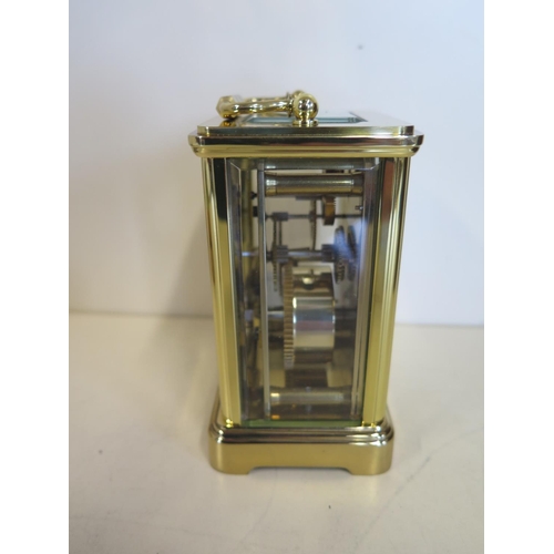 403 - A presentation brass carriage clock, the dial signed Aprey - 11cm tall, in clean running condition, ... 