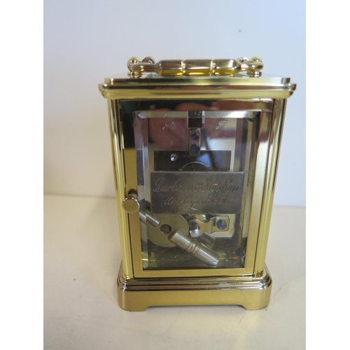 403 - A presentation brass carriage clock, the dial signed Aprey - 11cm tall, in clean running condition, ... 