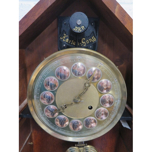 407 - An Art Nouveau Vienna secessionist oak wall clock by Gustav Becker with brass and copper dial striki... 