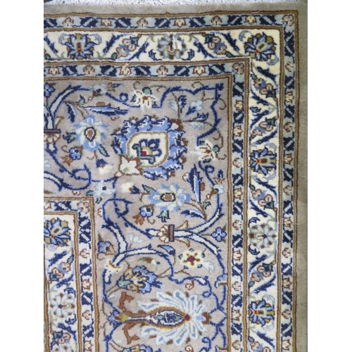 452 - A signed kashan, hand knotted, woollen rug with caucasian ground, approximately 415cm x 312cm, some ... 