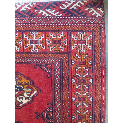 462 - A hand knotted woollen Turkman runner 288cm x 88cm - in good condition