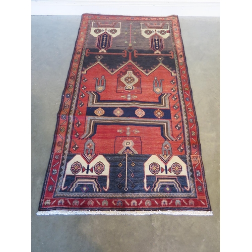 464 - A hand knotted woollen Hamadan rug - 196cm x 105cm - general good condition cut down from a larger r... 