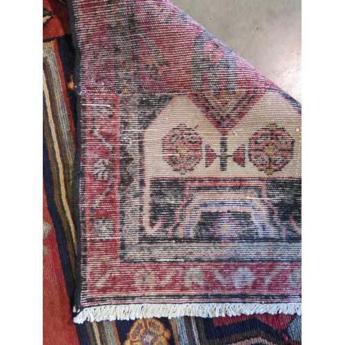 464 - A hand knotted woollen Hamadan rug - 196cm x 105cm - general good condition cut down from a larger r... 