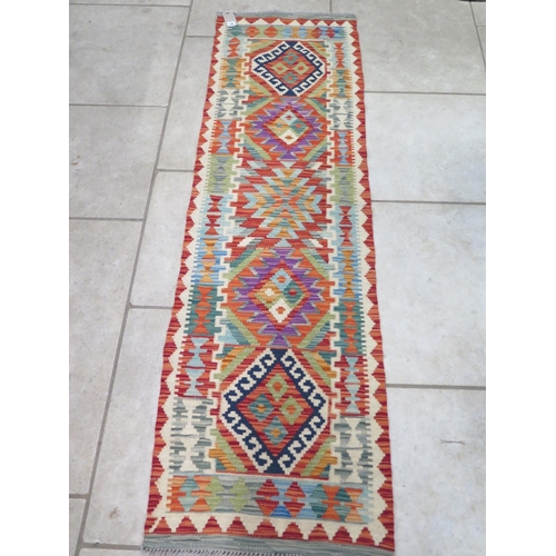 471 - A hand knotted woollen vegetable dye wool Chobi Kelim runner - 198cm x 60cm