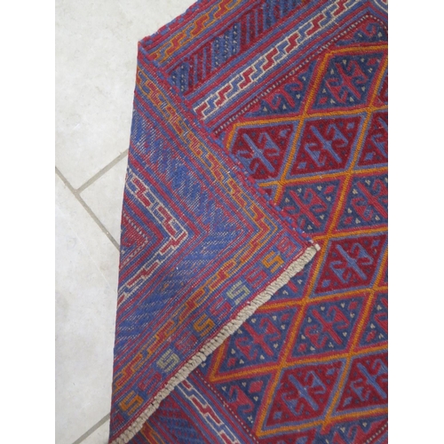 476 - A hand knotted woollen Gazak rug - 125cm x 120cm