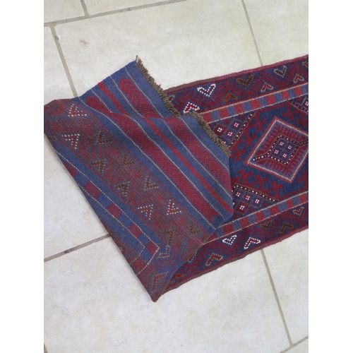 477 - A hand knotted woollen - Meshwani runner 242cm x 59cm