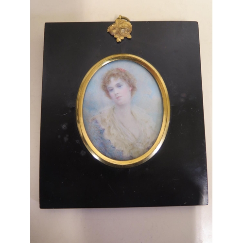 507 - A portrait miniature painting of a lady, signed Alwyn Williams, mounted in an ebonised frame, approx... 