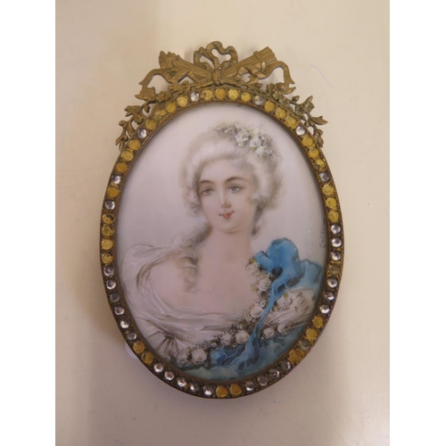 508 - A 19th Century portrait miniature of a lady, indistinctly signed, approx 9cm overall, in good condit... 