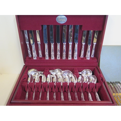 552 - A fine Harrods canteen of silver Kings pattern flatware, for eight servings, together with a boxed H... 