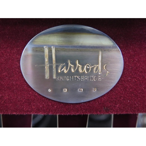 552 - A fine Harrods canteen of silver Kings pattern flatware, for eight servings, together with a boxed H... 