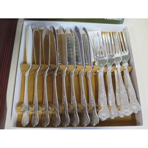 552 - A fine Harrods canteen of silver Kings pattern flatware, for eight servings, together with a boxed H... 