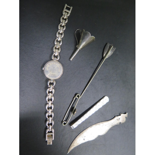 564 - A mixed silver lot consisting of a silver bangle with gold decoration, silver ladies watch, perfume ... 