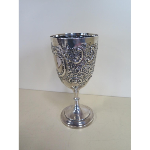 570 - An embossed silver goblet cup London 1901 - William Hutton and sons Ltd - 23cm H  - approx 10.7 troy... 