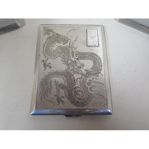 577 - Three silver cigarette cases, and a 900 silver cigarette case, total weight approx 24 troy oz