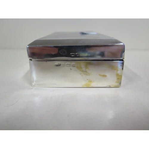 580 - A silver presentation cigarette box, 5cm x 16cm x 9cm - general wear and some dents, interior painte... 