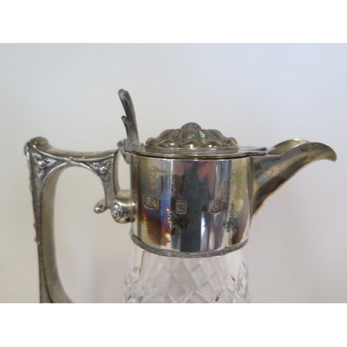 584 - A silver top claret jug by Michael Winter London 1981 - with original receipt for £230 - 28cm tall -... 