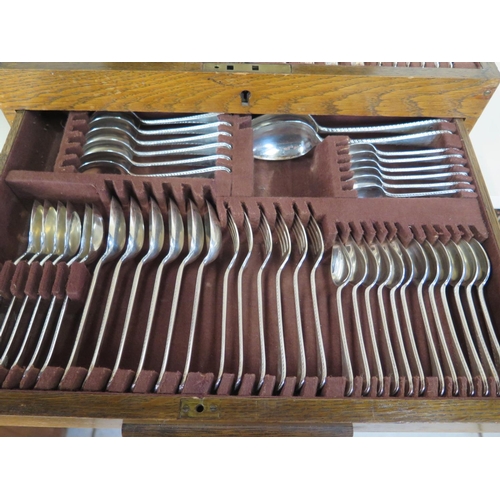 588 - A canteen of plated flatware, with engraved L to each handle, in good condition but with some wear