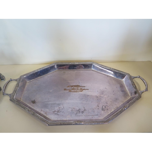 593 - A silver plated triform centrepiece 58 cm tall, and a plated tray 59cm wide, the centre piece with c... 