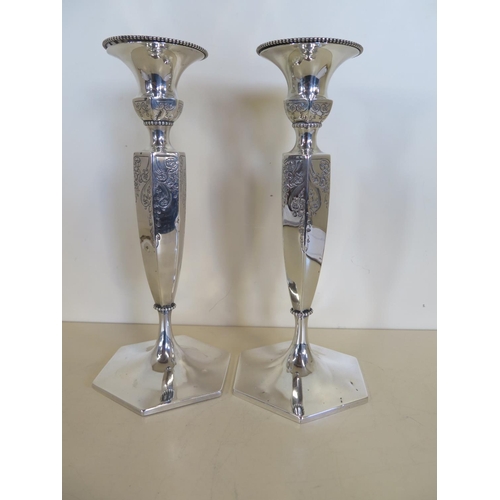 610 - A pair of sterling silver American candlesticks, JE Caldwell & Co - 25cm tall, total weight approx 1... 