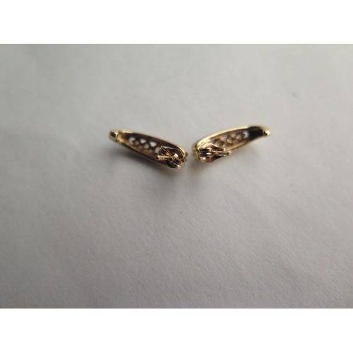 653 - A pair of 9ct hallmarked yellow gold five stone diamond earrings, 15mm long, approx two grams, total... 