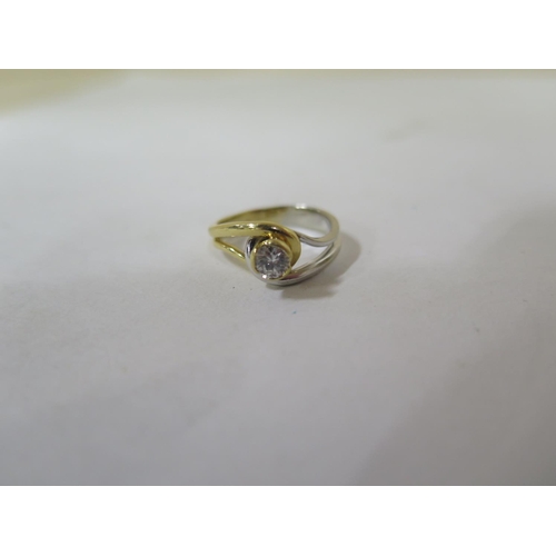 654 - An 18ct gold and white gold diamond solitaire ring, approx 0.31ct diamond - size K/L - approx 4.6 gr... 