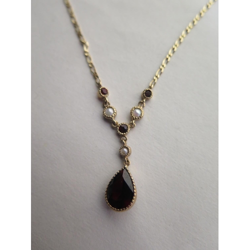 656 - A 9ct gold hallmarked garnet and pearl necklace - 40cm long approx 2.8 grams, overall good condition... 