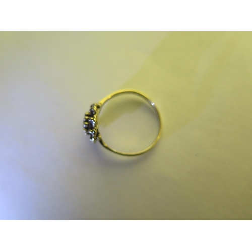 660 - A 9ct hallmarked yellow gold garnet ring, size L, approx 1.8 grams, some usage marks, consistent wit... 