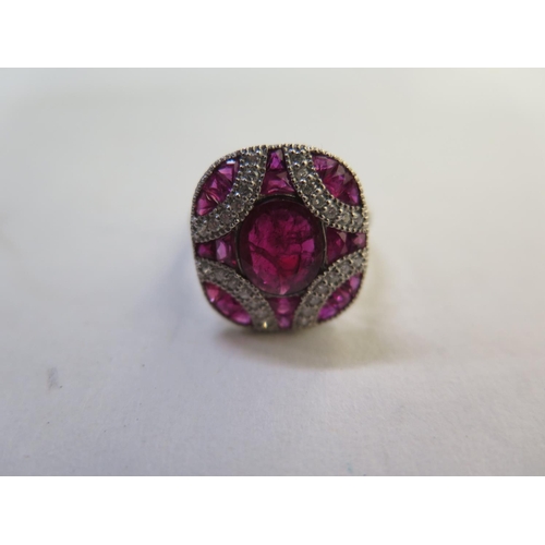 664 - An impressive 900 platinum ruby and diamond ring, with approx 0.30ct diamonds, and approx 4ct of Rub... 