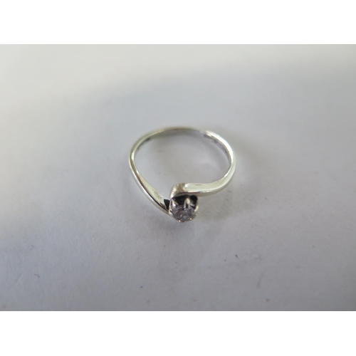 668 - A 9ct white gold solitaire diamond ring, approx 0.10ct, size O, approx 1.8 grams, some general usage... 