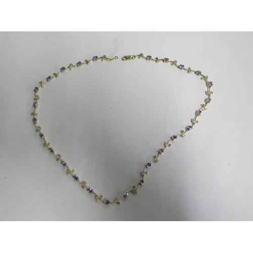 674 - A pretty 14ct tanzanite and diamond necklace, 42cm long, approx 16 grams, in good condition