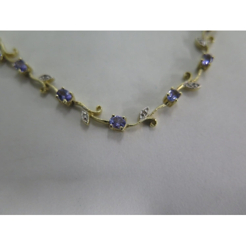 674 - A pretty 14ct tanzanite and diamond necklace, 42cm long, approx 16 grams, in good condition