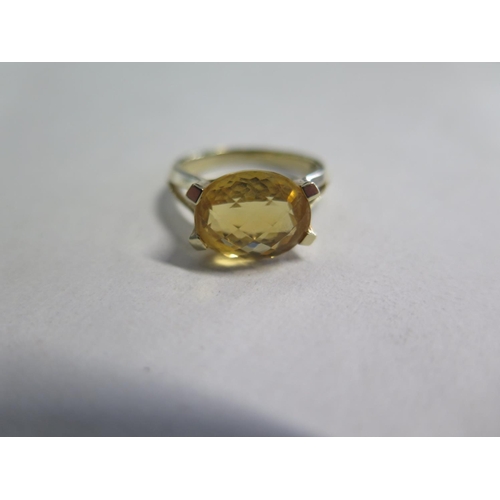 675 - A 9ct citrine set ring, sizer O/P approx 3.9 grams, some small usage marks but generally good