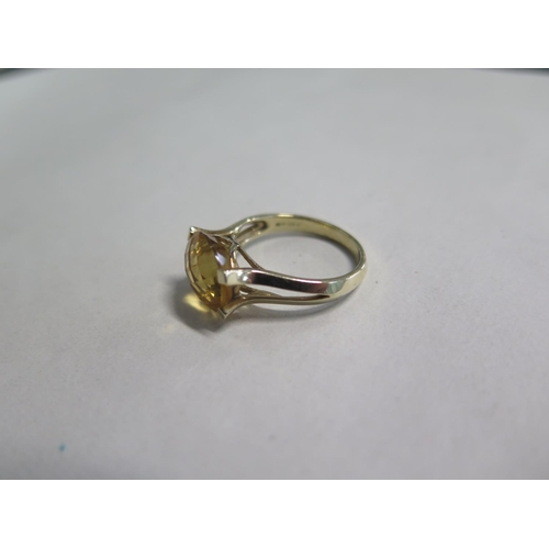 675 - A 9ct citrine set ring, sizer O/P approx 3.9 grams, some small usage marks but generally good