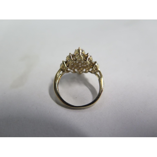 677 - A 9ct diamond cluster ring, size J, approx 2.5 grams, diamonds bright, good condition