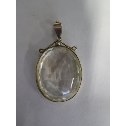 681 - A large faceted stone pendant mounted in gold, 5.5cm x 3.5cm - overall good condition, minor usage m... 