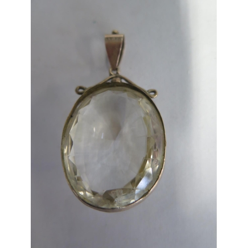 681 - A large faceted stone pendant mounted in gold, 5.5cm x 3.5cm - overall good condition, minor usage m... 