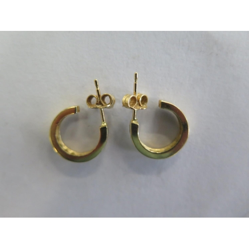 684 - A pair of 18ct emerald and diamond set hoop earrings, approx 3 grams, 1.5cm wide, minor usage genera... 