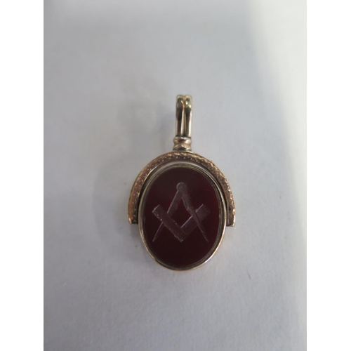 685 - A gold plated masonic fob, 3.5cm tall, wear to gold on one side, stone is intact