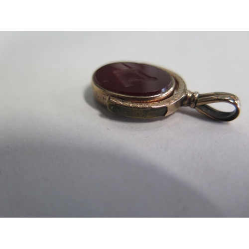 685 - A gold plated masonic fob, 3.5cm tall, wear to gold on one side, stone is intact