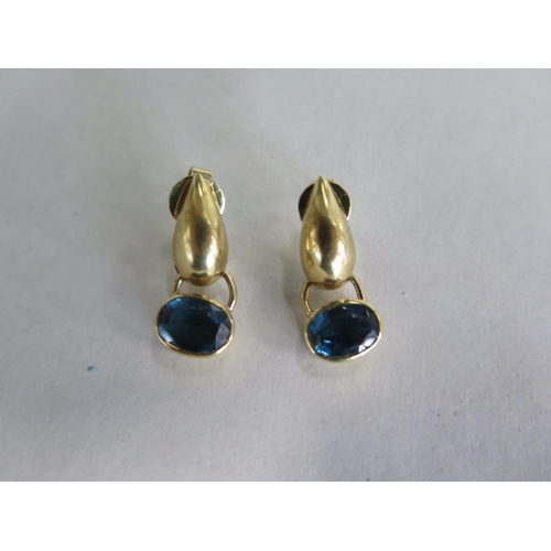 690 - A pair of 18ct drop earrings set with blue topaz stones, 20mm long, approx 5.7 grams, in good condit... 