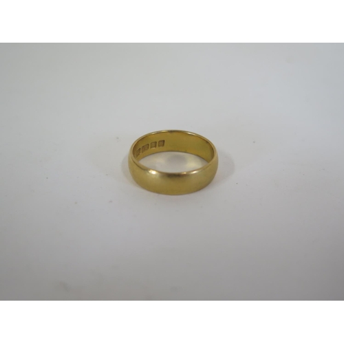 696 - A 22ct gold ring, approx 6.8 grams, ring size Q, generally in good condition but with some surface w... 