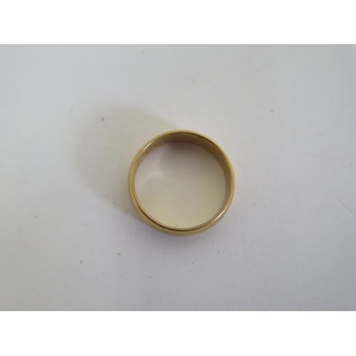 696 - A 22ct gold ring, approx 6.8 grams, ring size Q, generally in good condition but with some surface w... 