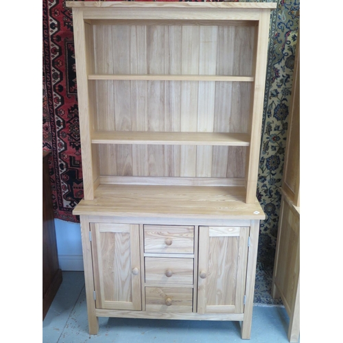 73 - A modern beech dresser with a shelved top over base with drawers and cupboard doors, 117cm H x 97cm ... 