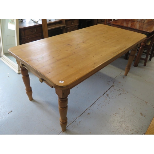 82 - A modern pine kitchen table with two end drawers - 183cm x 93cm