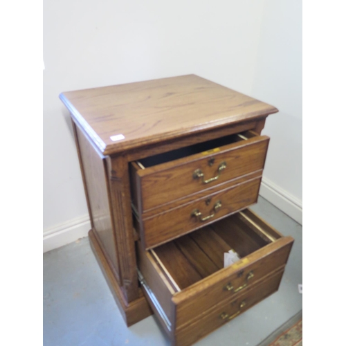 9 - A good quality oak two drawer filing cabinet, matching previous lot - 80cm tall x 62cm