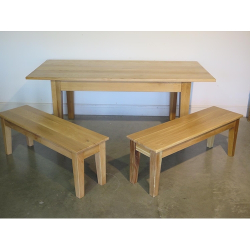 94 - A new oak dining table and two benches made by a local craftsman to a high standard, table H75cm x 1... 