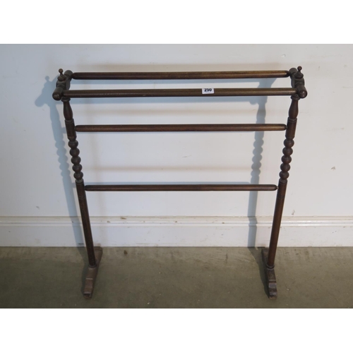 250 - A Victorian beech wood towel rail