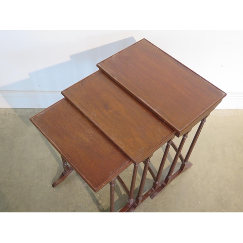 252 - A nest of three mahogany side tables - 63cm H x 49cm x 30cm