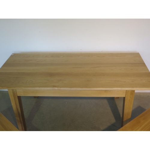 91 - A new oak dining table and two benches made by a local craftsman to a high standard, table H75cm x 1... 